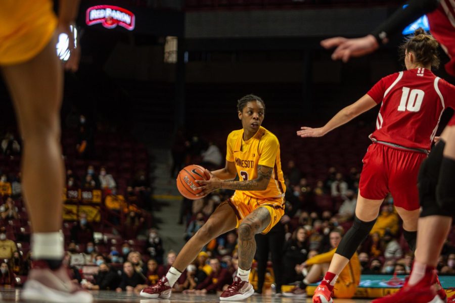 Guard Deja Winters looks to pass the ball during the Gophers’ game against Wisconsin at Williams Arena, Jan. 30. The Gophers beat the Badgers, 57-55.