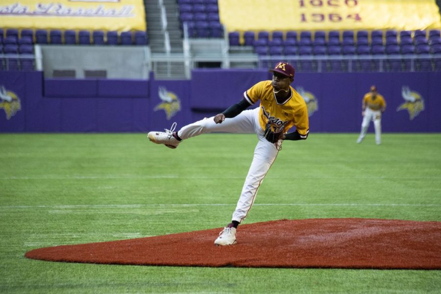 Pitcher J.P. Massey pitches the ball during the Gophers 7-6 win against Texas Christian University  at U.S. Bank Stadium in Minneapolis, Minn. on Saturday, Feb. 23, 2020.
