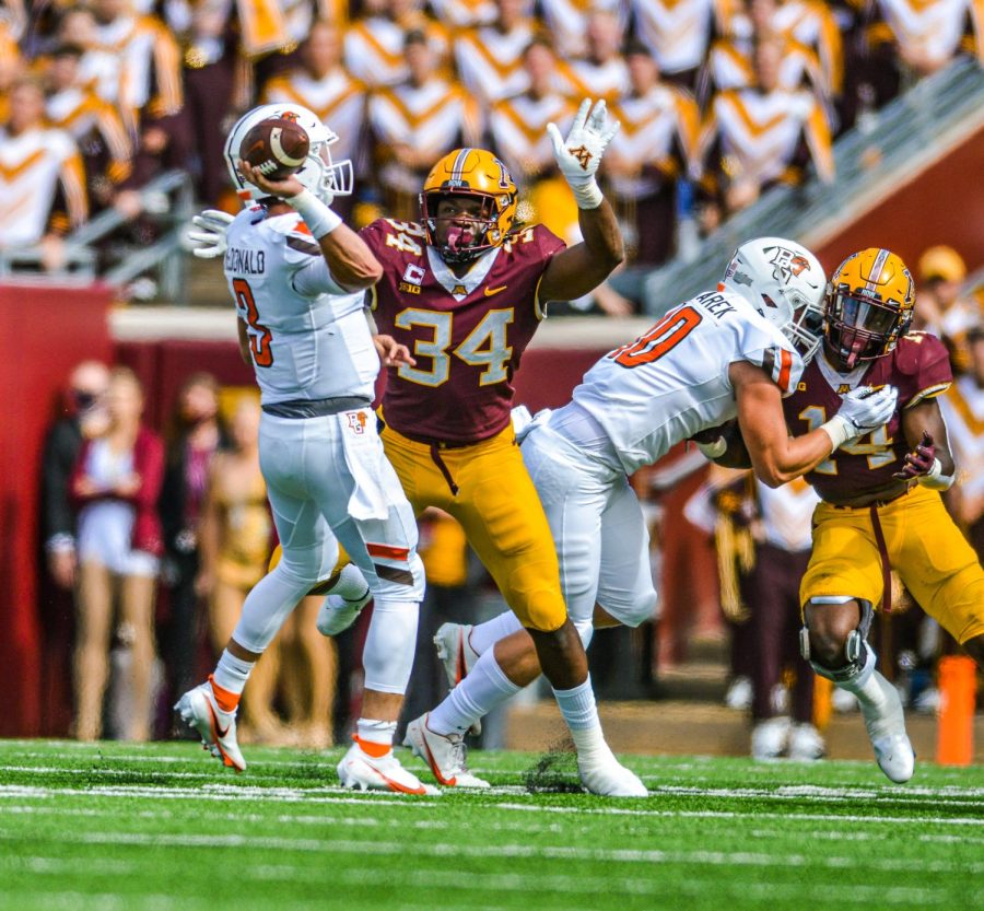 Hands up, defensive lineman Boye Mafe attempts to block Bowling Green quarterback Matt McDonalds pass during the Gophers football game against Bowling Green at Huntington Bank Stadium on Saturday, Sept. 25, 2021.