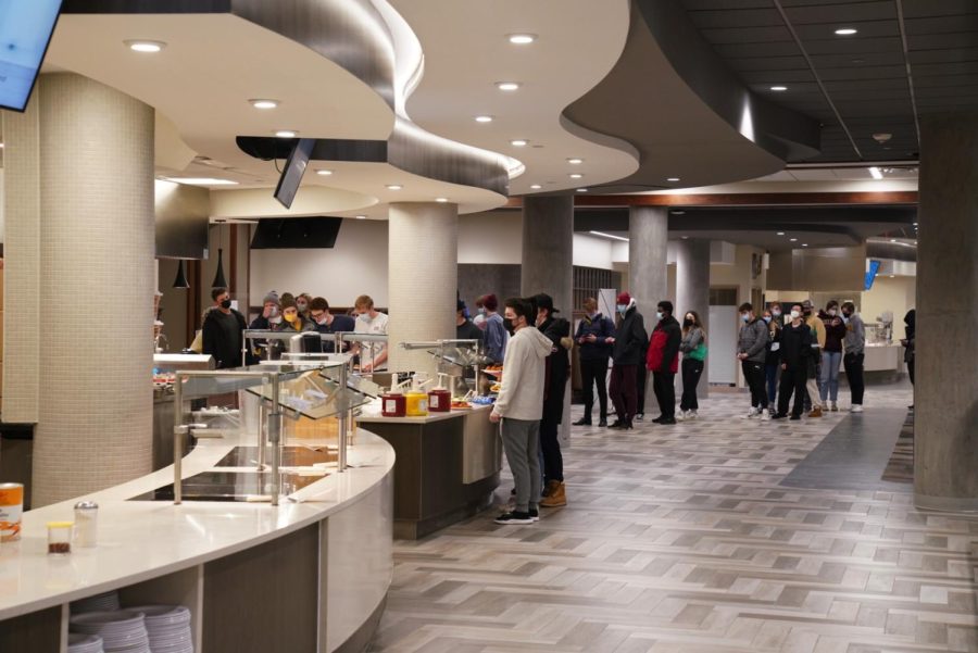 Students+wait+in+lines+at+the+Pioneer+Hall+Dining+Center+on+Sunday%2C+Feb.+13.+