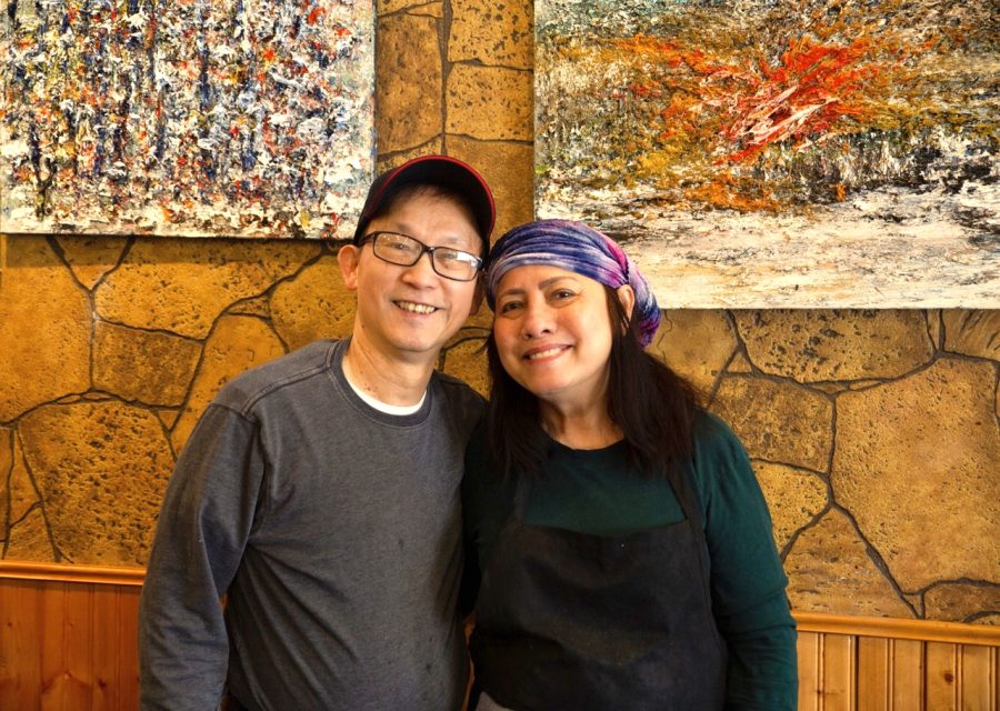 Camdi Restaurant owners, Camdi and Kiet, pose for a photo on the last day before the restaurant closed, Saturday, March 26. Camdi Restaurant was open in Dinkytown for over 35 years.