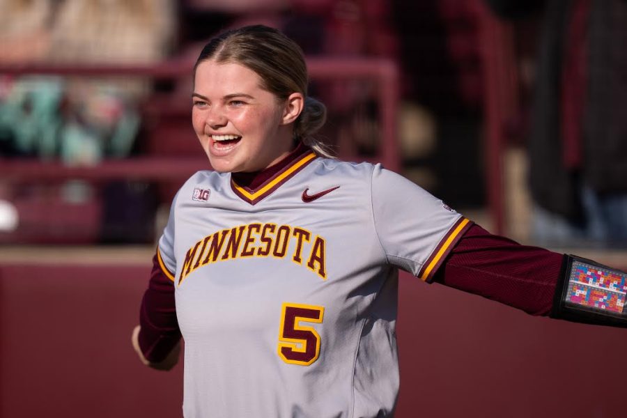 Sophomore Sara Kinch smiles as she helps the Gophers to a 9-3 win over St. Thomas on Tuesday, April 26, 2022, at Jane Sage Cowles Stadium in Minneapolis, Minn.