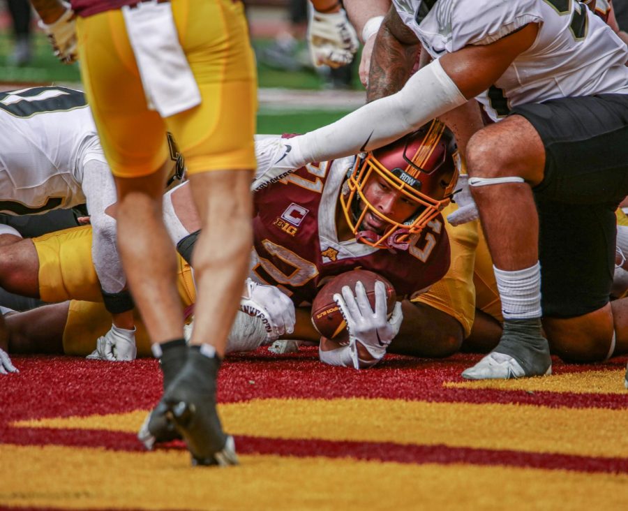 Running back Bryce Williams dives in the end zone to score a touchdown during the Gophers game against Purdue, Saturday, Oct. 1. The Gophers lost, 20-10. 