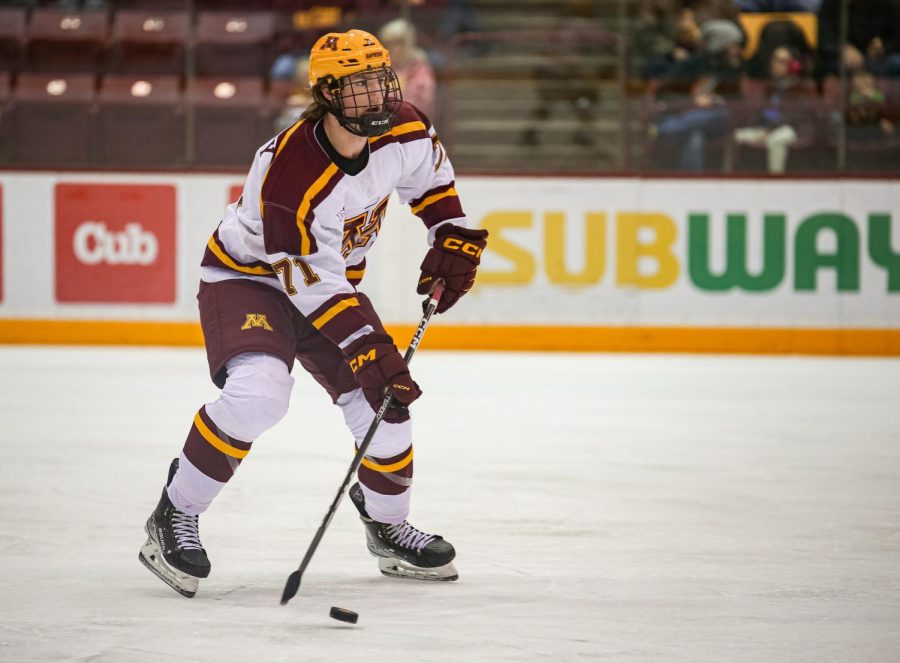 Ryan Chesley looks to pass the puck during the Gophers game against Notre Dame, Friday, Nov. 4. Minnesota won, 4-1.