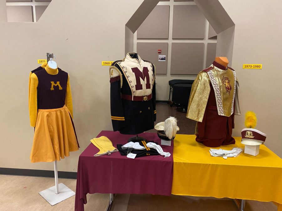 The panel discussion, held at the Music Rehearsal Hall at Huntington Bank Stadium, featured old uniforms from the marching band.
