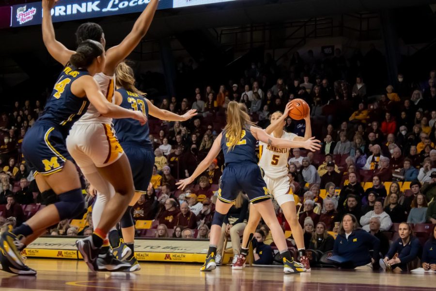 Guard Maggie Czinano attempts to pass the ball during the game against Michigan on Sunday, Jan. 29.