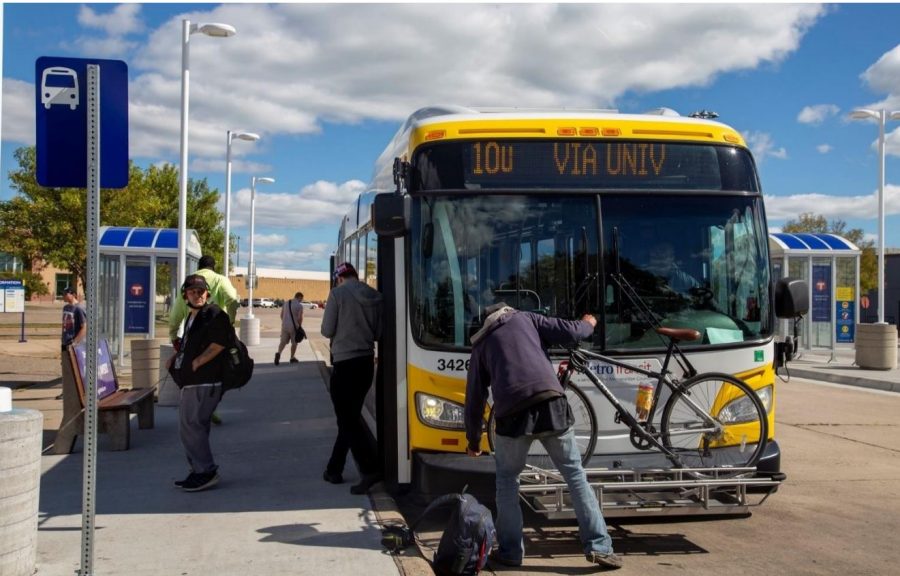Passengers getting on and off a Route 10 bus at Northtown Transit Center in September 2022. Photo courtesy of Metro Transit.