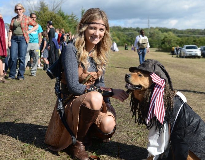 Jody McGuire poses outside of the Minnesota Renaissance Festival with her dog Chewy on Sept. 17, 2016. McGuire donned an elf costume while Chewy was dressed as a pirate for the fairs pet costume contest.