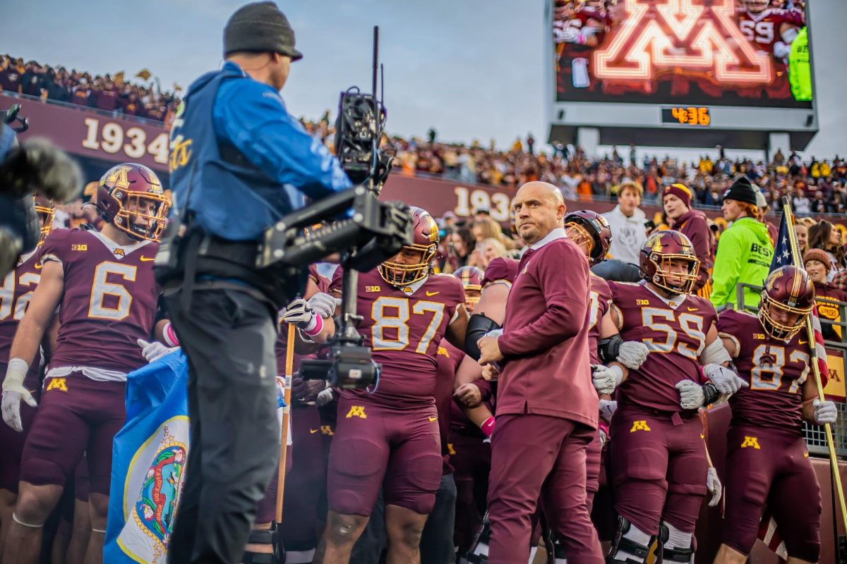 PJ Fleck looks at the crowd in the Huntington Bank stands before leading Gophers football out onto the field before they play the Michigan Wolverines on Oct. 7, 2023.