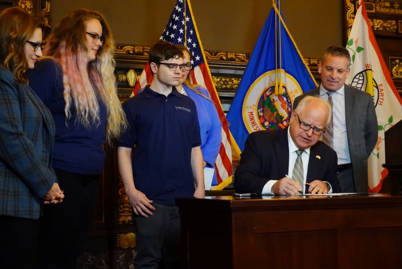 Gov. Tim Walz signs the executive order eliminating four-year college degree requirements for state jobs into effect on Oct. 30.