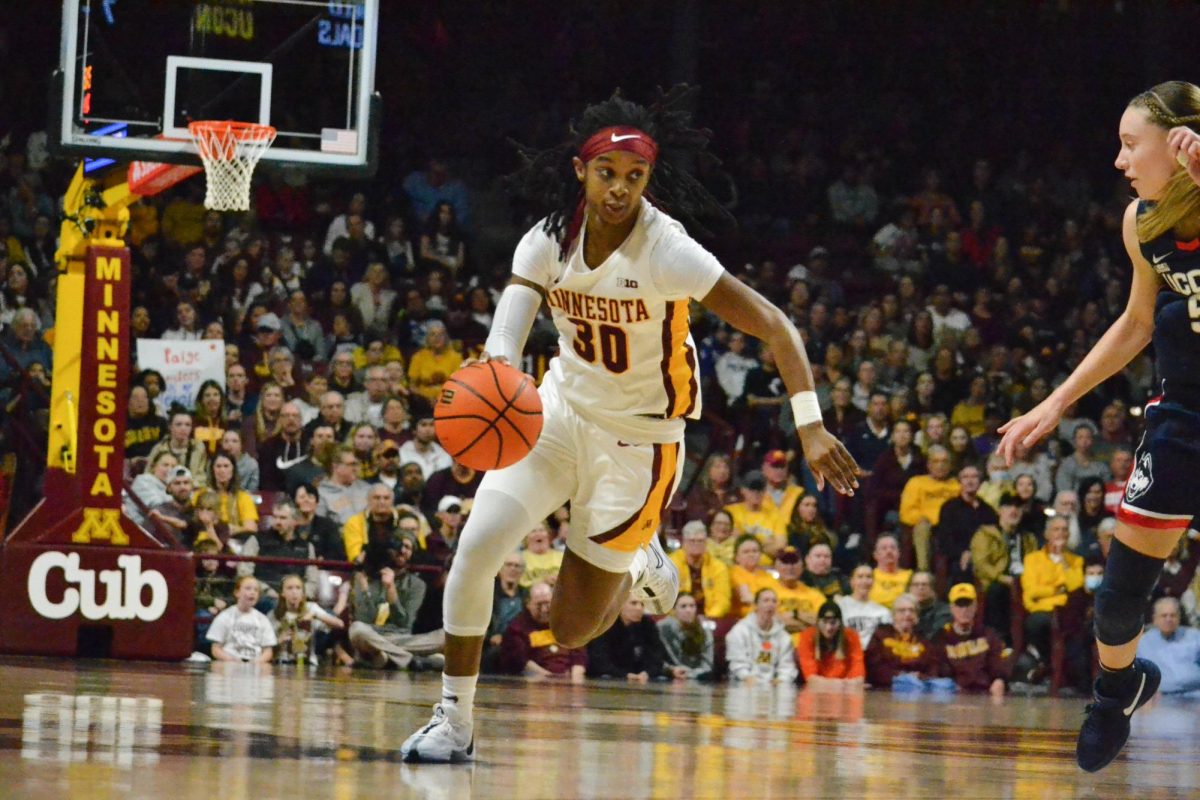 Janay+Sanders+dribbles+the+ball+on+Sunday%2C+Nov.+19%2C+2023.+The+Gopher%E2%80%99s+Women+Basketball+team+faced+off+against+University+of+Connecticut%2C+and+lost+with+a+score+of+62-44.