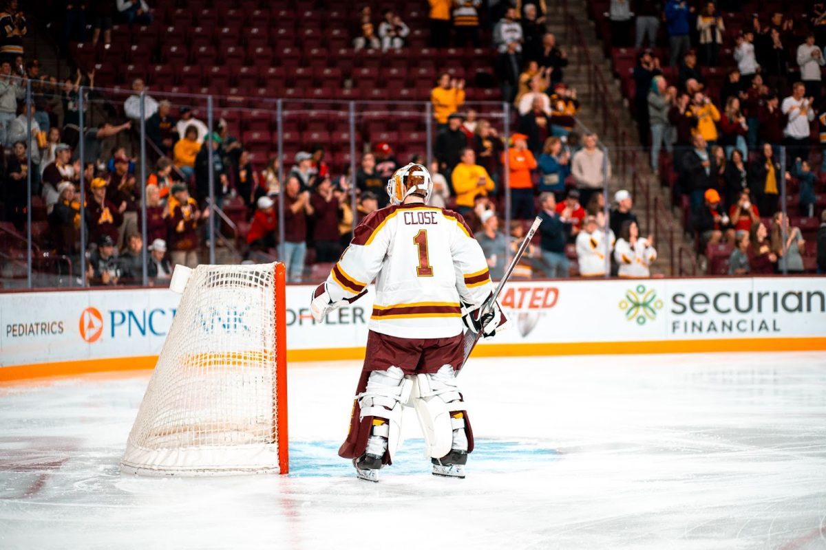 Gophers goalie Justen Close takes his place by the goal at the start of the Big Ten game against Wisconsin. The No. 14 Wisconsin Badgers beat the No. 1 Minnesota Gophers 5-2 on Thursday, Oct. 26.