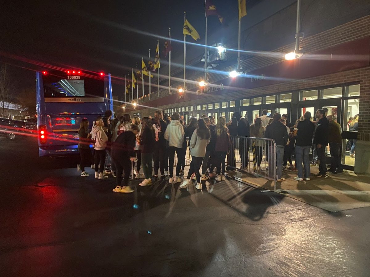 Fans stood outside Williams Arena after the Gophers womens basketball game on Nov. 19 and waited for the UConn team to board the bus.