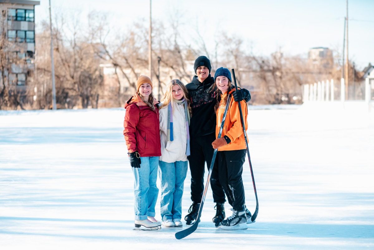 Gwyn, Macy, Daniel, and Nora [pictured left to right] brave the sub-zero windchill on an icy afternoon to skate together in Van Cleve park. The park, located just north of Dinkytown in Como, becomes a popular winter activity hub for students and nearby residents each year when the park’s fields are frozen to create a public ice skating rink.