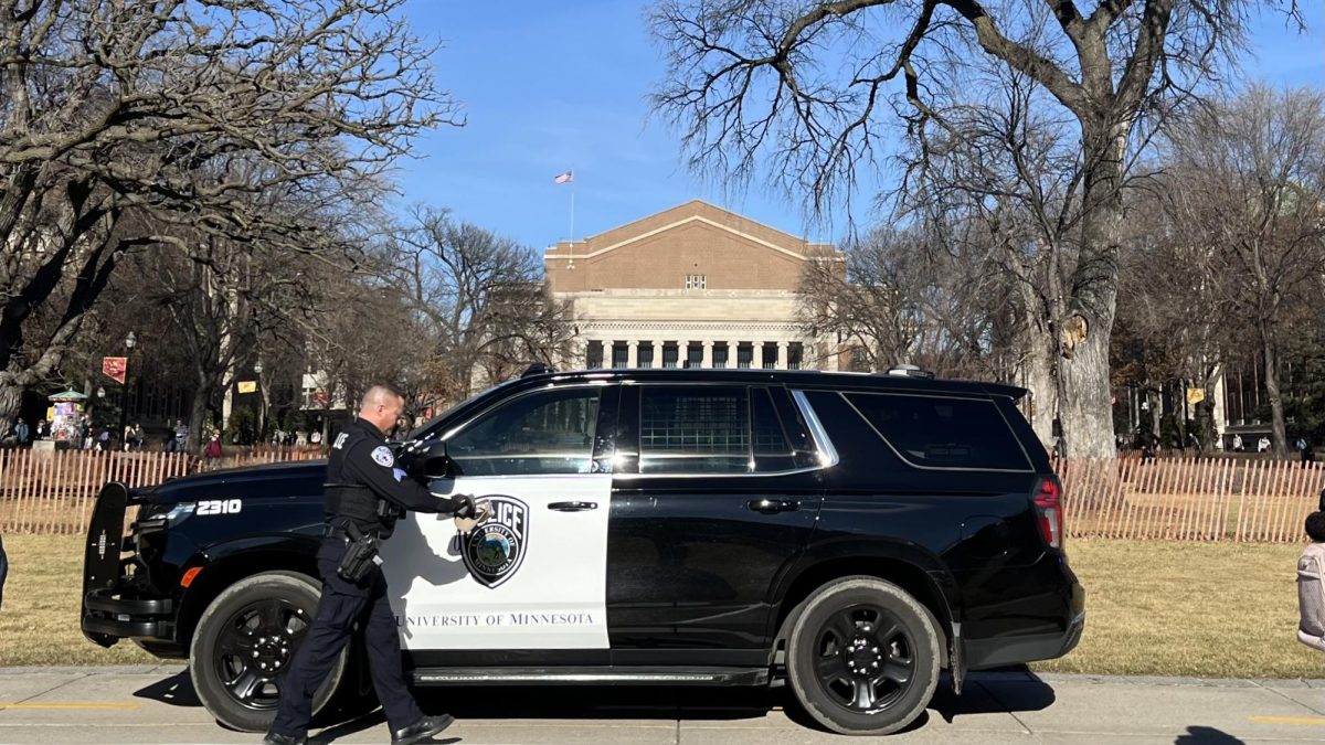 A UMPD police officer on Northrop Mall on Feb. 1, 2024. A SAFE-U alert sent Saturday night cautioned people to stay away from the area.