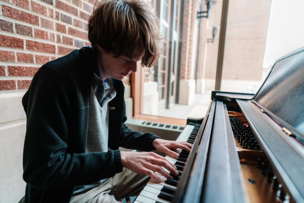6:18 p.m. Eric, a student, expertly improvises an ethereal, jazzy melody on the public piano in Coffman Union.