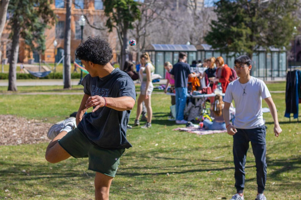 A sunny day on campus
Roommates Mikai Stewart (left) and Chao Hung (right) have made a hobby out of playing hacky sack, which Mikai said he learned from his brother growing up. They were two among many spending time outside at the Knoll during the comfortable weather on Wednesday.