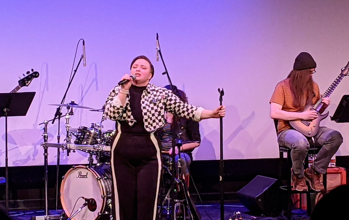 Lead vocalist Rick X. Hoops performs alongside drummer Aerynne Holmes (back) and guitarist Fred Nolte (left) in Queer Life: A Trans Narrative Recital on Thursday. The GSC’s debut production recontextualizes musical numbers into a trans narrative.
