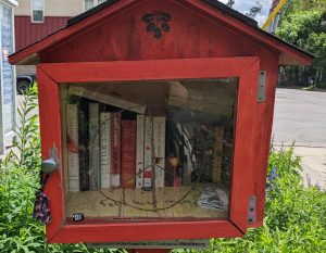 The little free library at the Como Corner Community Garden at the corner of Como and 22nd avenues implores visitors to “feed their minds.”