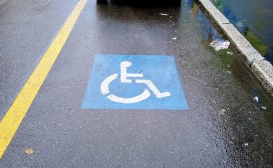 Empty handicap parking on a rainy June day in Minneapolis.