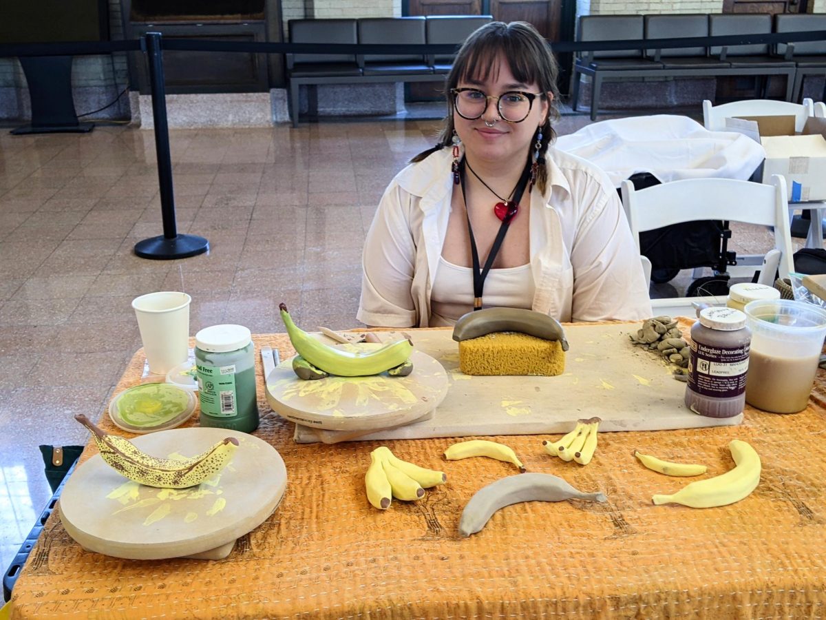 Katja Johnson and her ceramic bananas, which she demonstrated how to make at the Mudluk Pottery table for the 2024 American Craft Fest in St. Paul.