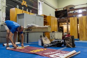 Minnesota Mens Gymnastics Head Coach Mike Burns starts to clean up the teams practice gym, which has been their home for over 30 years. Uncertainty looms about where theyll go next.