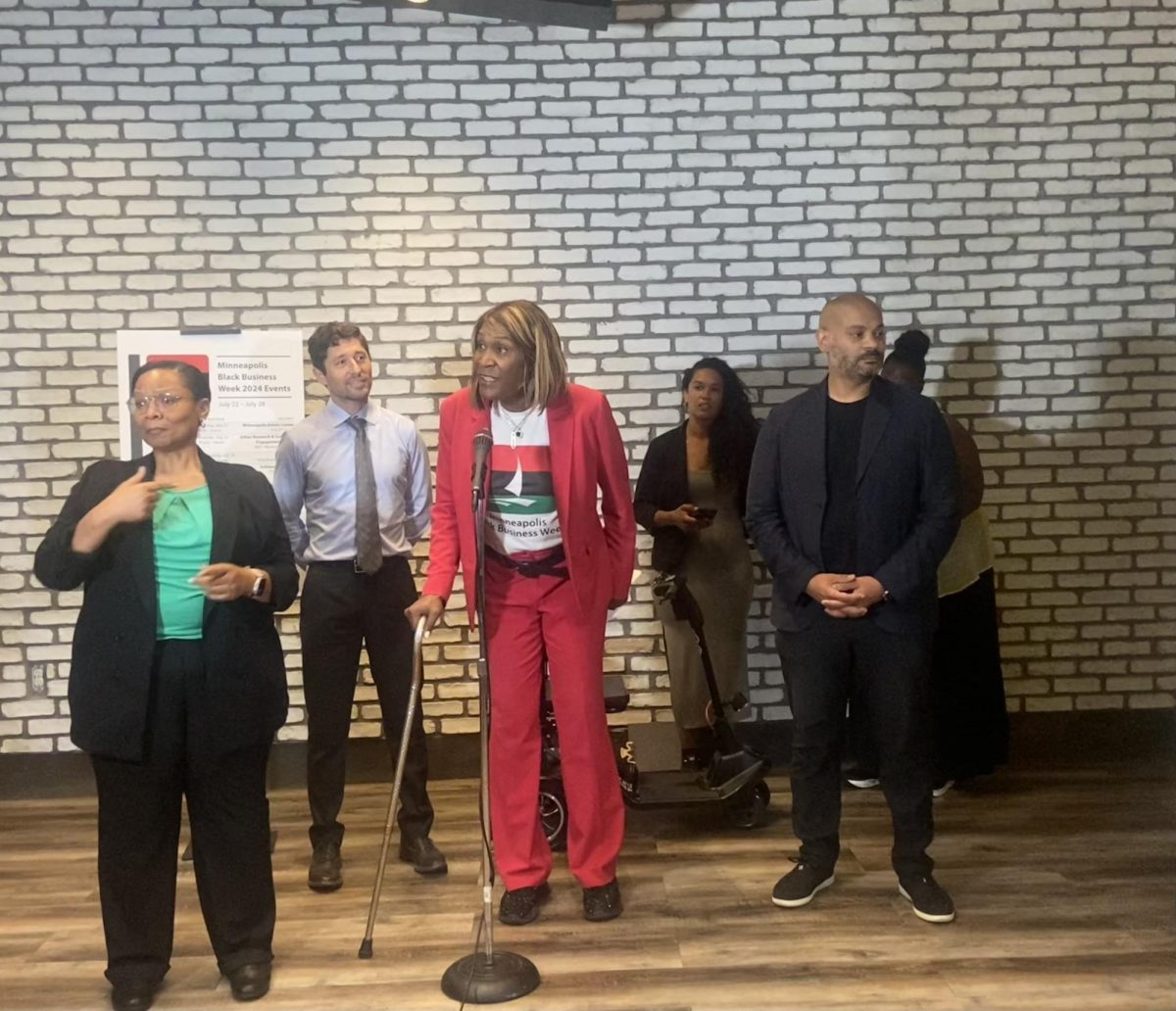 West Broadway Business and Area Coalition Crystal Porter and Lutungi from Lutungi’s Palate speaking at the Black Business Kickoff Event on Monday.