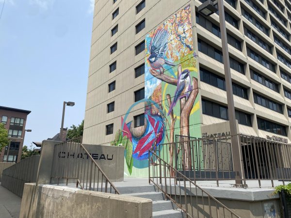 The new mural was brought on by a two-year community effort to brighten up the concrete walls of the brutalist apartment building.