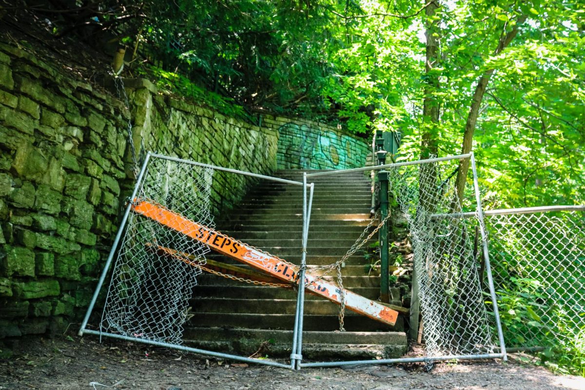 Minnehaha Park and Falls has graffiti behind the fall, deteriorated walls and stairs, and a lack of accessibility to the falls.  