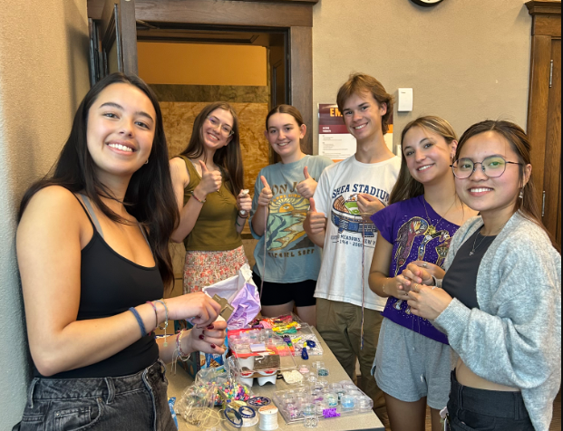 Club members hold discussions and student-led fundraisers to raise money for scholarships. Courtest of UMN She's the First.