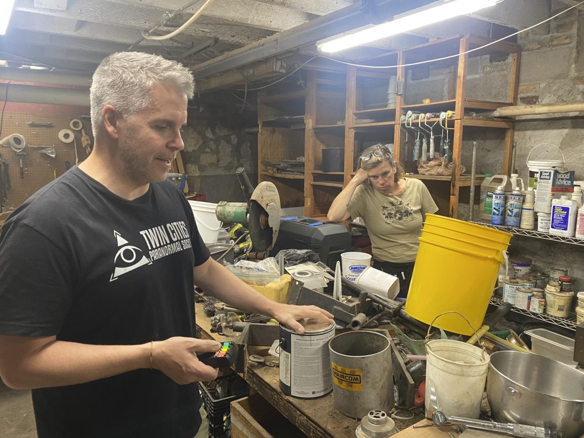 Thomas Troupe and Gina Christ attempt to record evidence of a spirit in the basement of the Black Forest Inn.