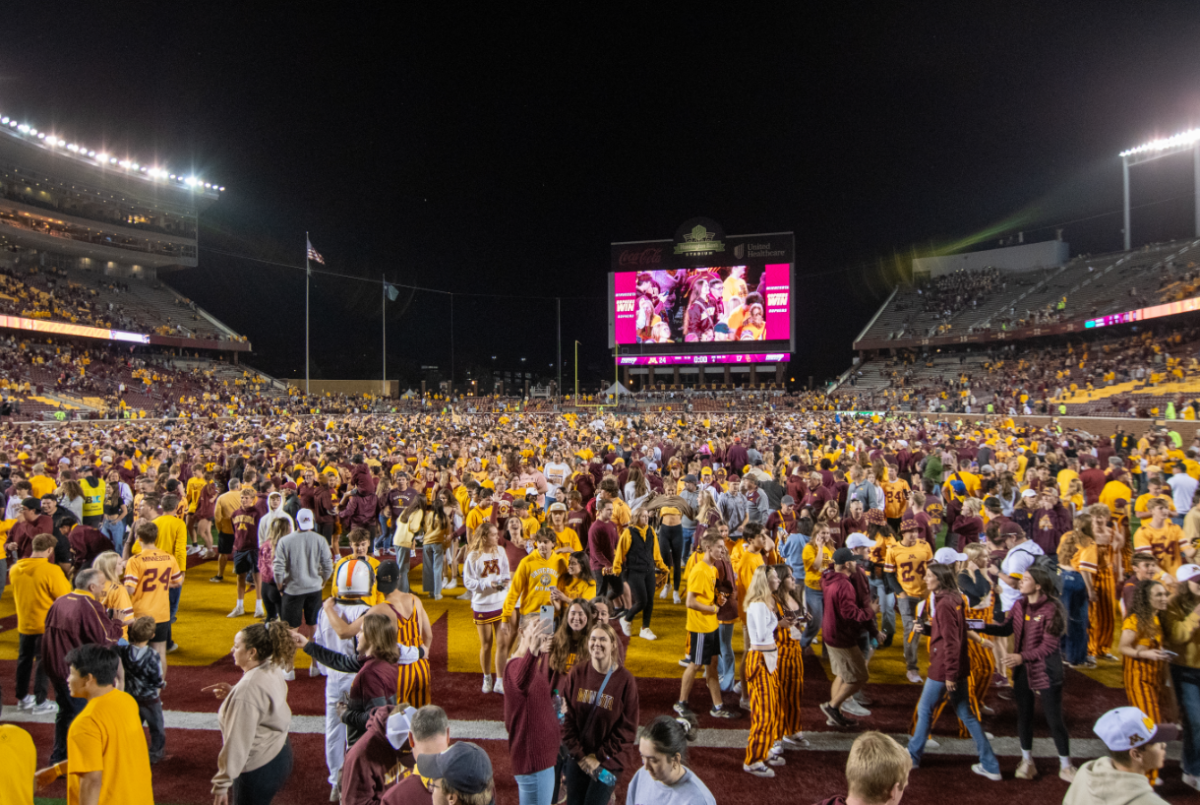 Gophers fans celebrated their team's upset win against No. 11 USC on Oct. 5 after they rushed the field.