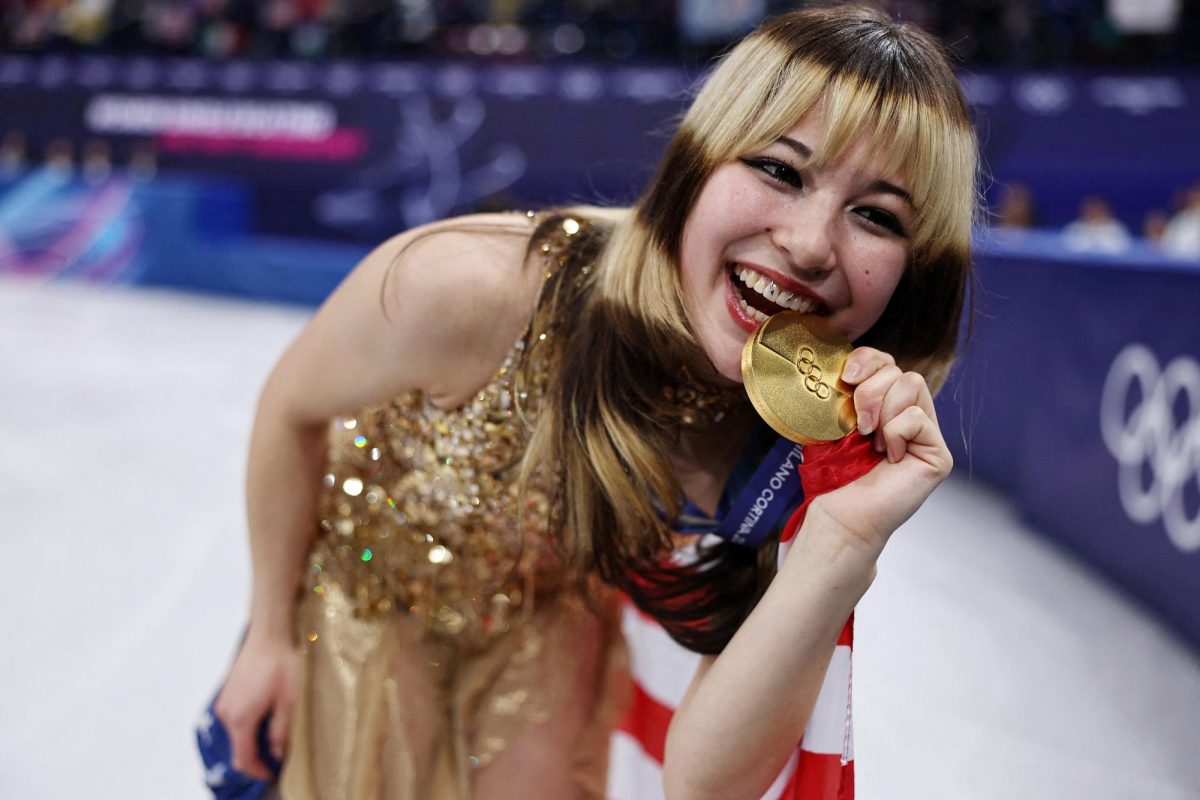 Milano Cortina 2026 Olympics - Figure Skating - Women Single Skating - Victory Ceremony - Milano Ice Skating Arena, Milan, Italy - February 19, 2026. Gold medalist Alysa Liu of United States celebrates after winning the Women Single Skating. | Photo courtesy of Amanda Perobelli/REUTERS 