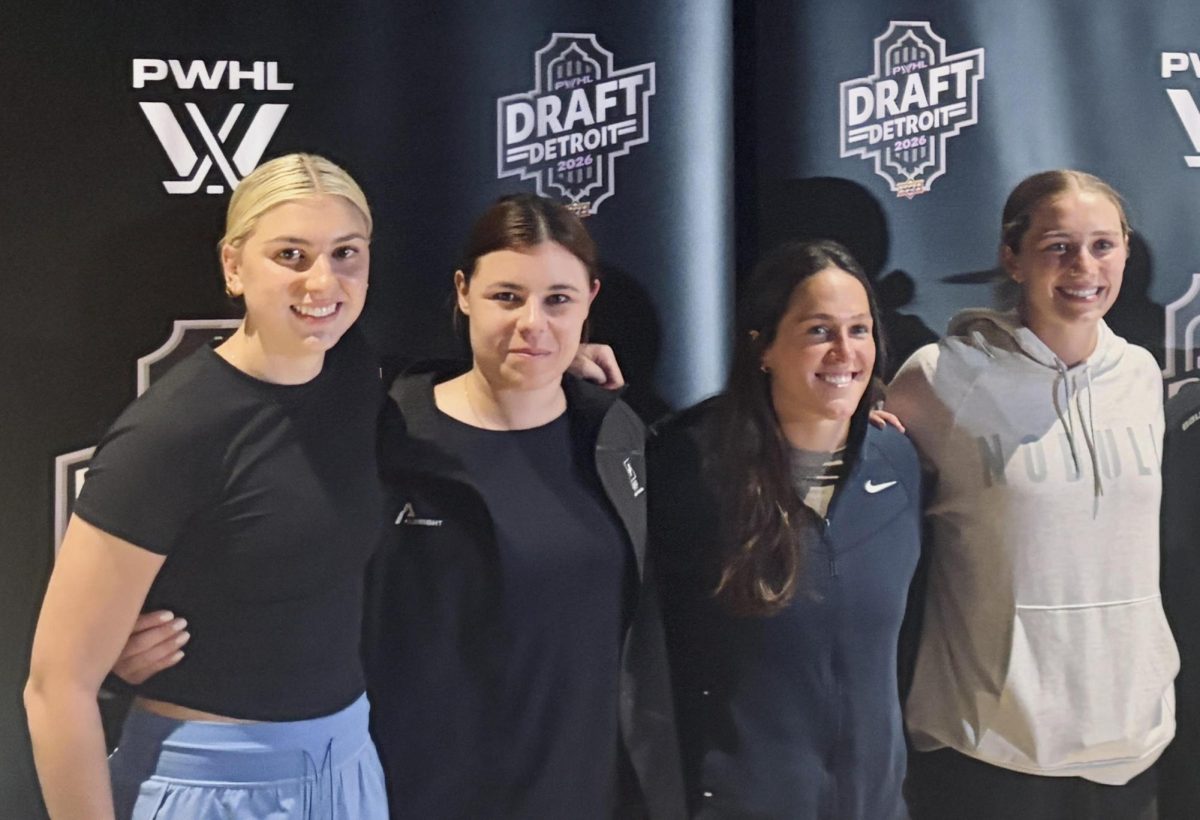 Sara Swiderski, Andrea Braendili, Abbey Murphy and Caroline Harvey take group photos on June 16 ahead of the PWHL Draft.