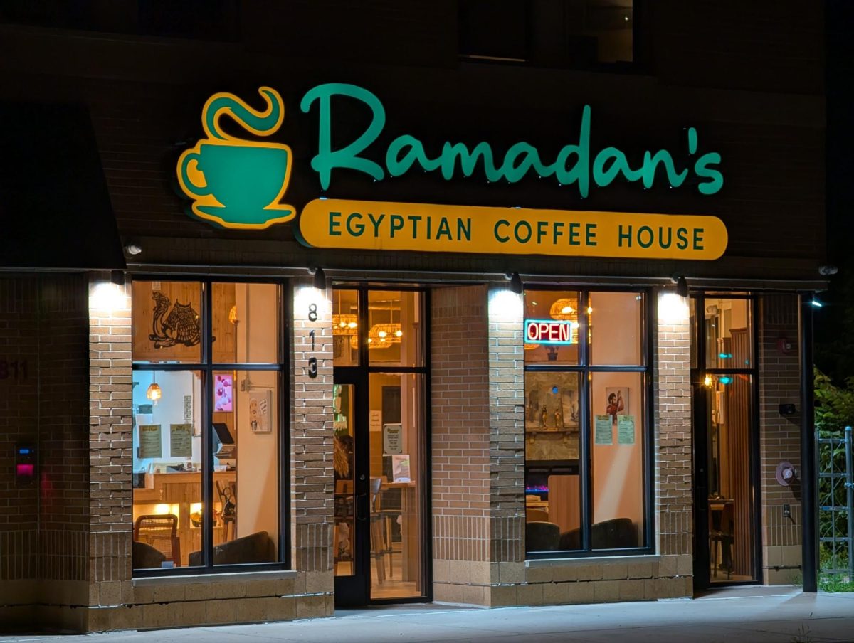 The storefront of Ramadan's Egyptian Coffee House is illuminated at night on June 26, 2026, in Minneapolis.